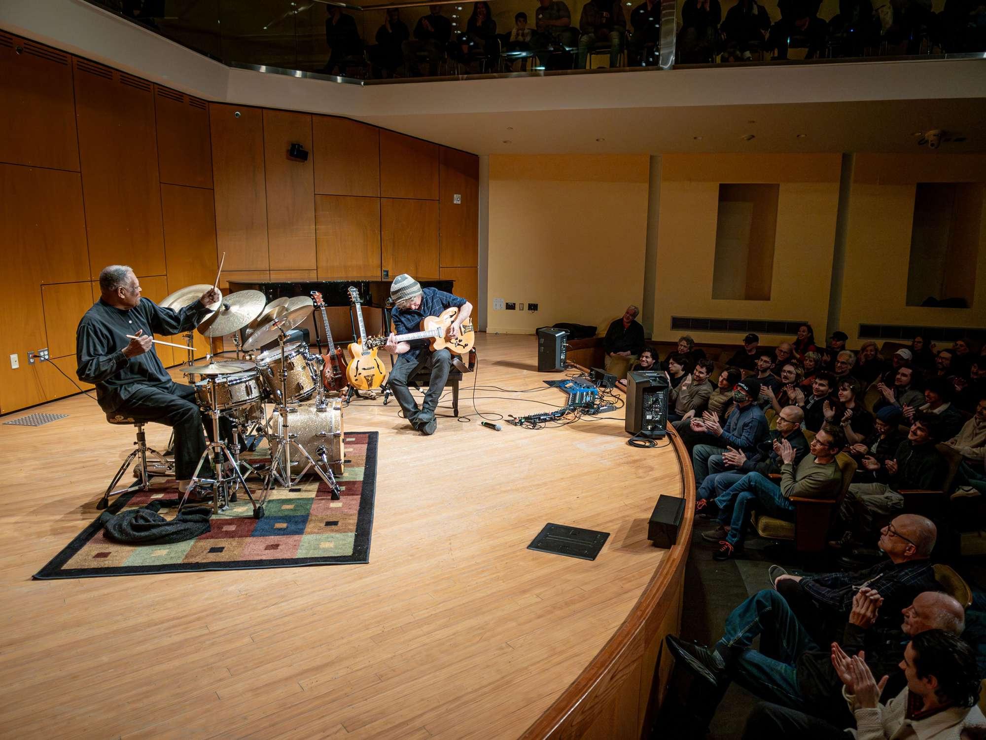 Pat Metheny and drummer Billy Hart perform onstage.